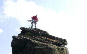 Phil Shaw, Extreme Ironing on Rivelin Needle, Sheffield, UK